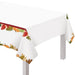 A 54" x 102" Thanksgiving Changing Seasons Plastic Table Cover.