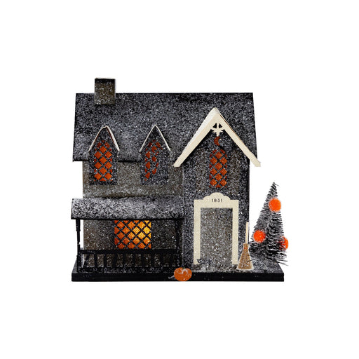 An 5.5-inch Halloween Haunted Village Witches Cottage decoration.