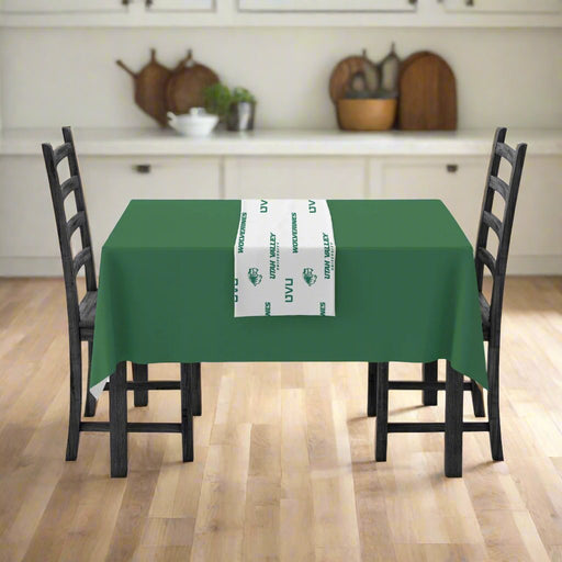 A UVU Vinyl Table Runner mocked up on a table setting