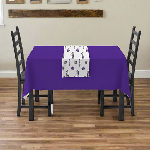 A Weber State University Vinyl Table Runner mocked up on a table