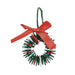 A completed wreath ornament from the Cool2Create Green & Red Button Wreath Ornament Craft Kit.  Consisting of red, white, and green buttons arranged on a string to make a wreath shape with a red bow at the top and a green string for hanging.